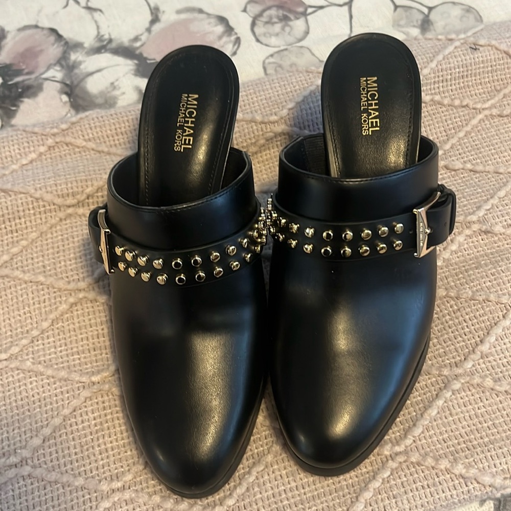 Brand new without box Michael Kors mules, size 7.